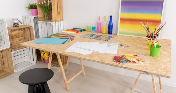 Craft room with art supplies on the table