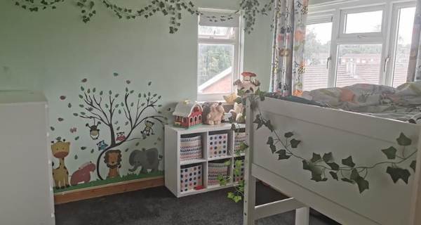 childs bedroom with cartoon animals